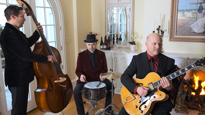 Alegria entire band trio performing live for a private event