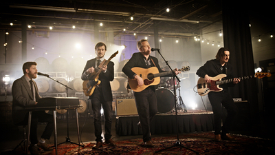 Jackson Flats band performs on stage for live college event