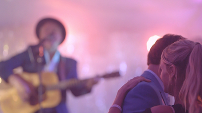 Jackson Flats couple slow dances while band acoustic guitar plays