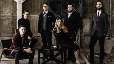 Free The promotional photo of band in color 
